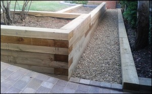THE WOODEN SLEEPERS RAISED BED 
