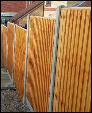 THE FEATHER EDGE PANELS FENCE.