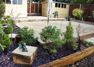 THE PATIO WITH LEVELS AND THE ROCKERY GARDEN WITH DECORATING STEPS...
